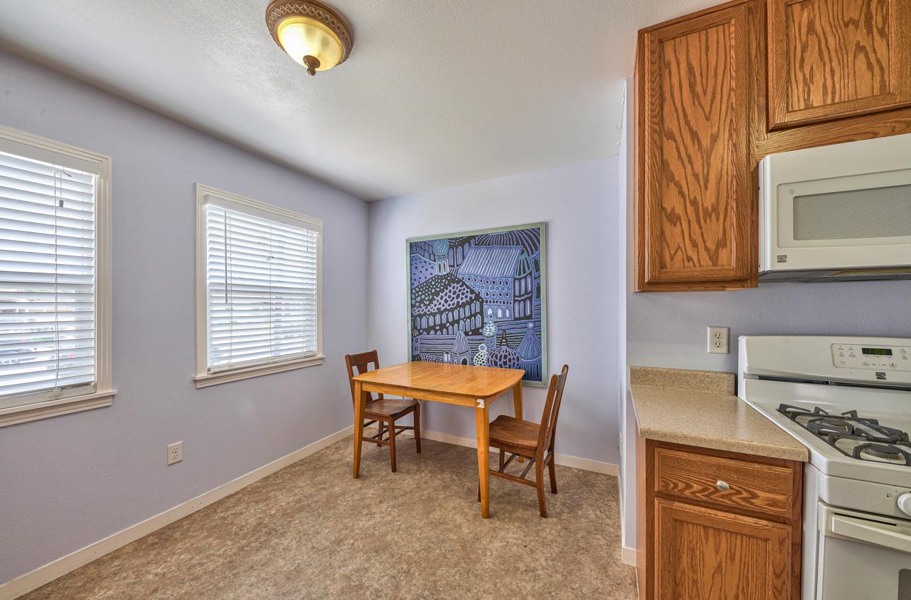 75 Mayfair Drive Salinas, CA 93905 - Photo 11 of 20 a room that has a chair and a stove in it