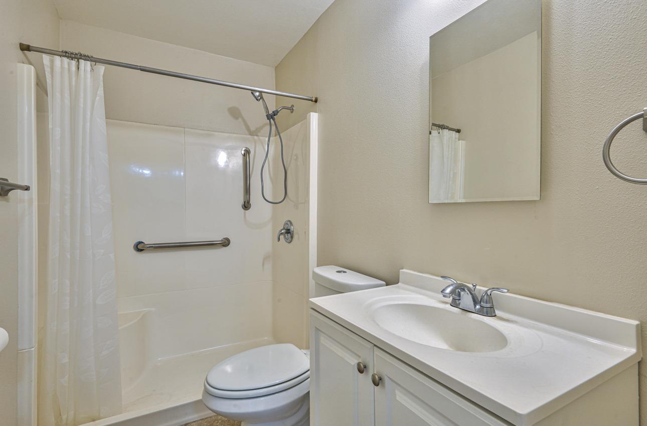 75 Mayfair Drive Salinas, CA 93905 - Photo 16 of 20 a bathroom with a sink toilet and shower