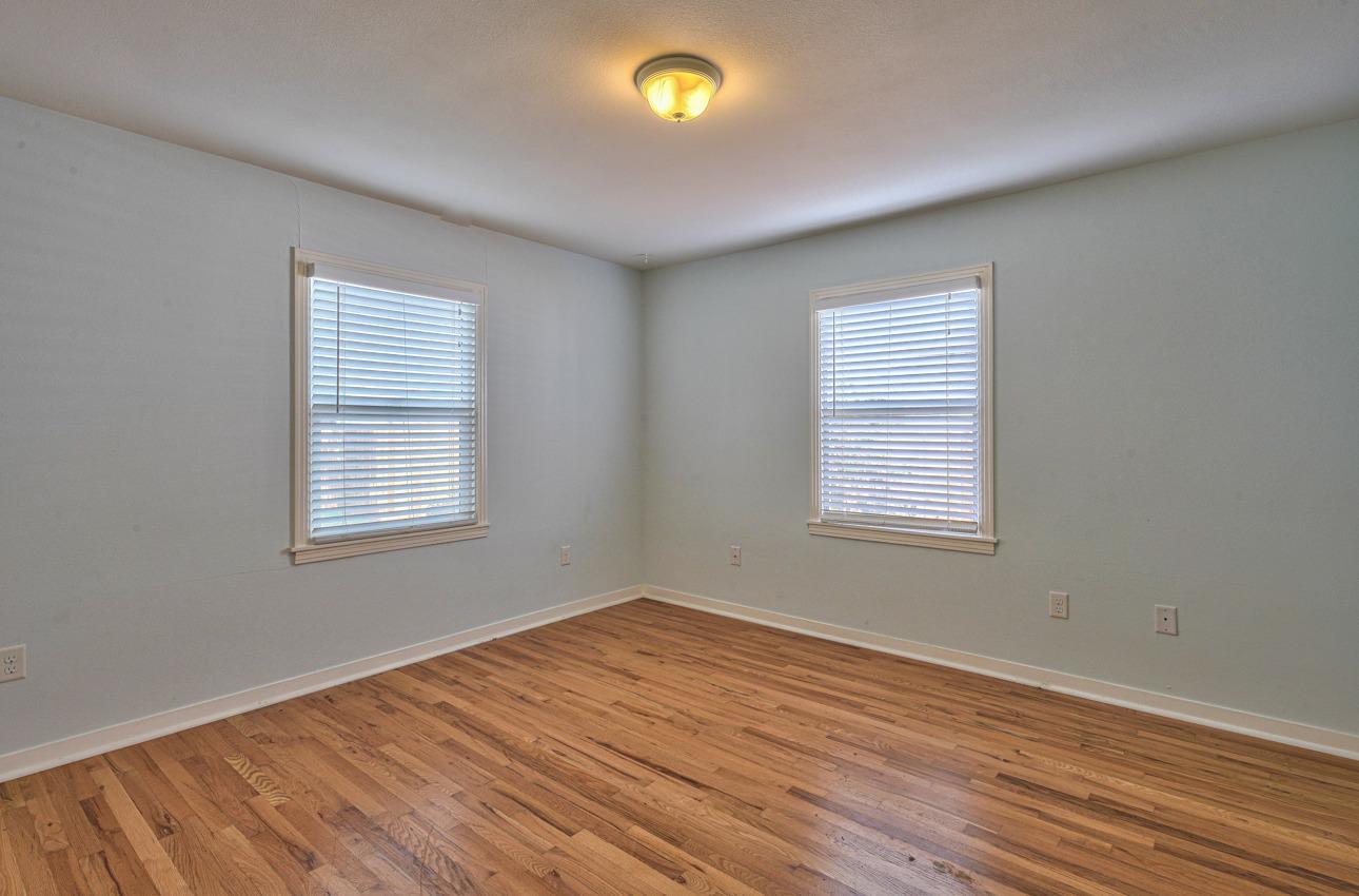 75 Mayfair Drive Salinas, CA 93905 - Photo 10 of 20 wooden floor in an empty room with a window