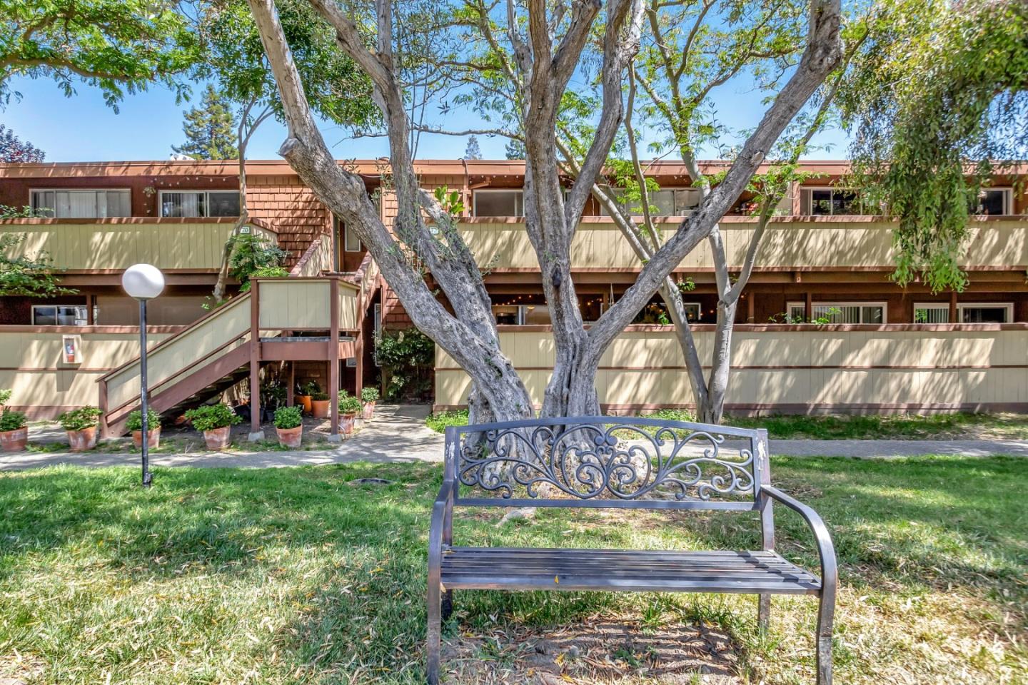 500 West Middlefield Road, Unit 71 Mountain View, CA 94043 - Photo 3 of 42 a view of a house with a yard