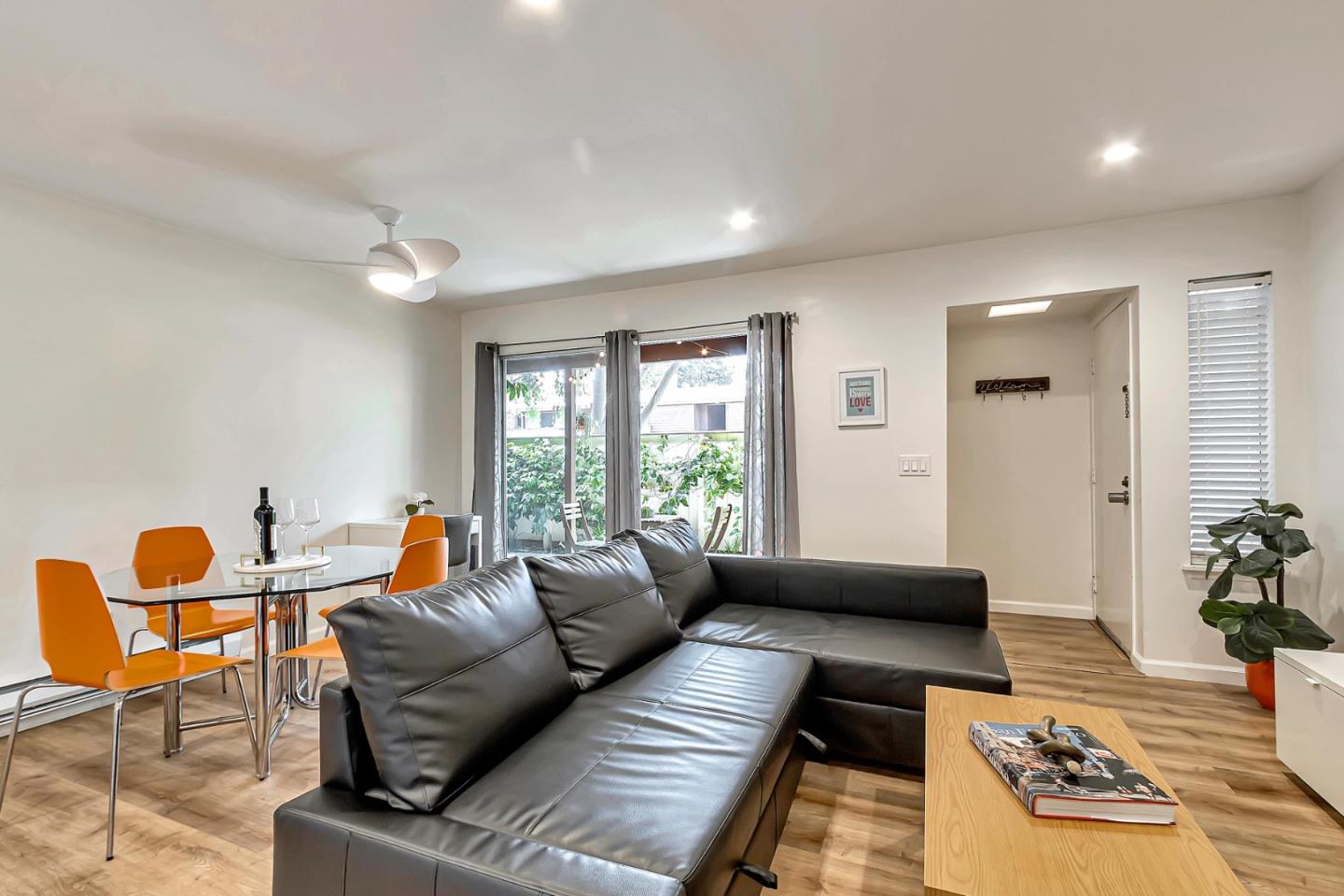 500 West Middlefield Road, Unit 71 Mountain View, CA 94043 - Photo 8 of 42 a living room with furniture and a window