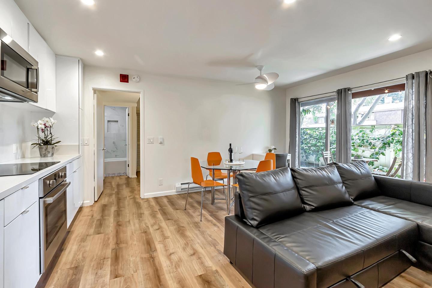 500 West Middlefield Road, Unit 71 Mountain View, CA 94043 - Photo 10 of 42 a living room with furniture and a fireplace