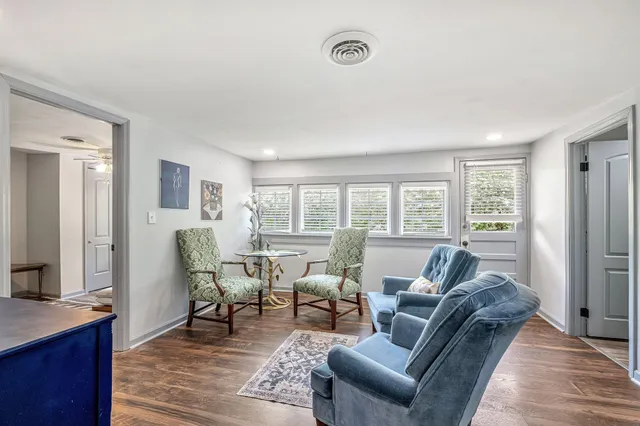 a view of a dining room with furniture window and outside view