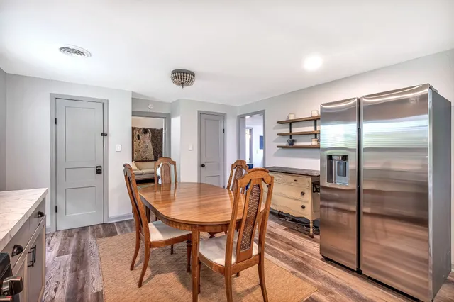 a workspace with furniture and window