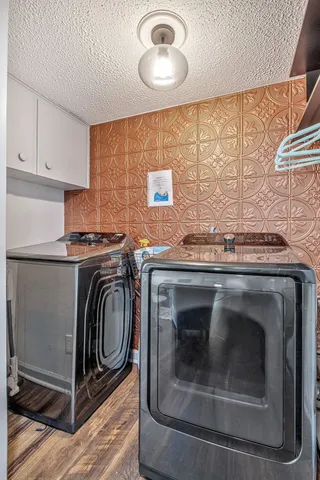 a bedroom with a bed and a fireplace