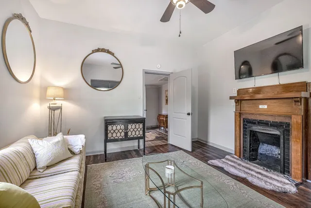 a living room with furniture and a window
