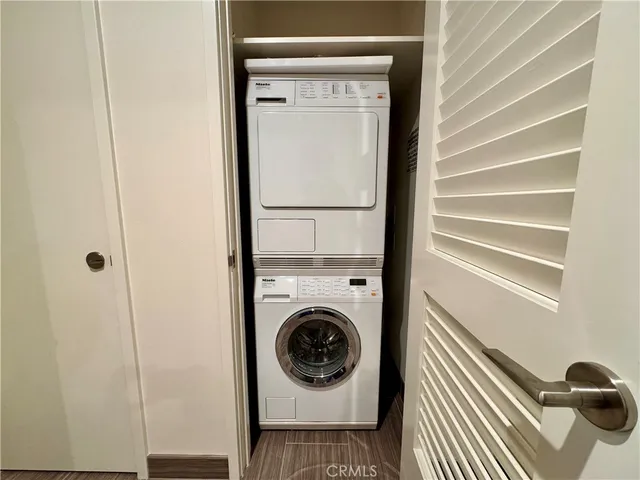 a utility room with washing machine
