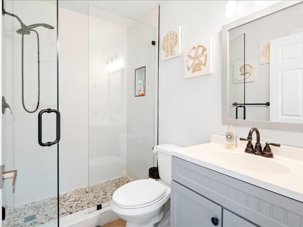2469 Florida Avenue Naples, FL 34112 - Photo 24 of 31 Full bath with a stall shower and vanity