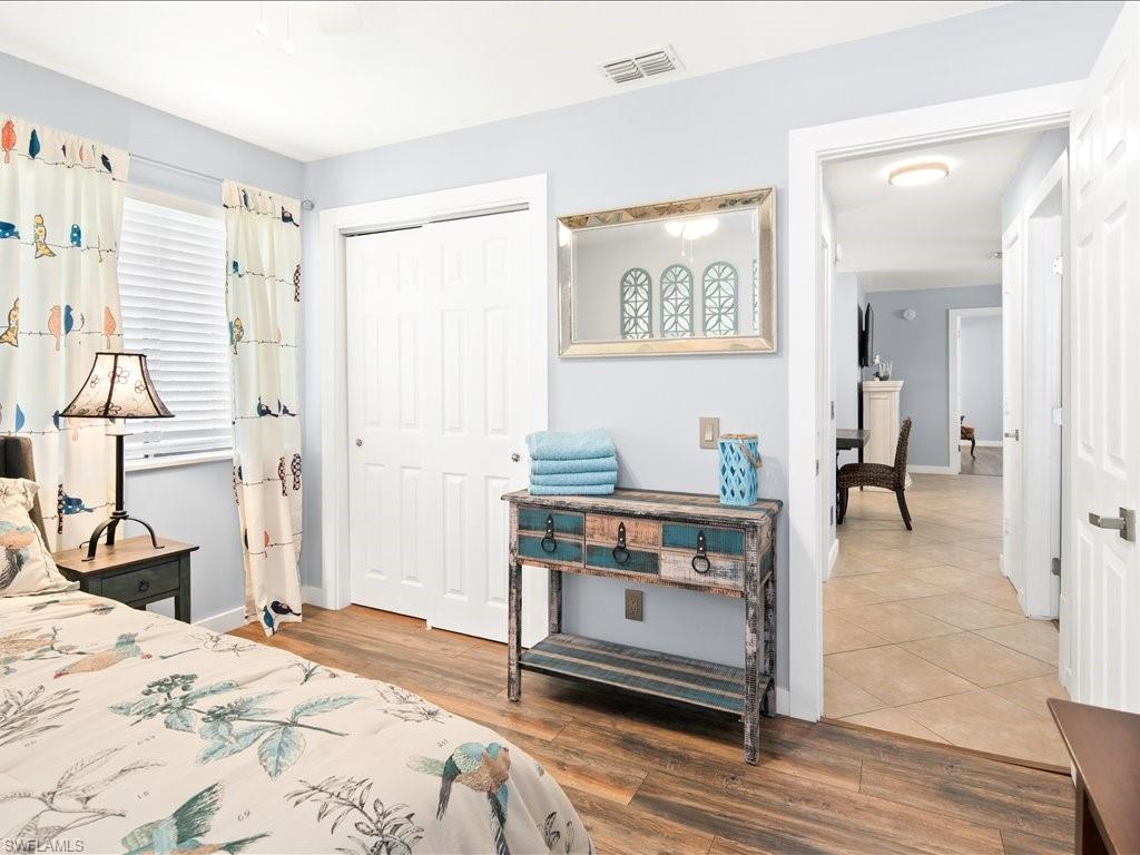 2469 Florida Avenue Naples, FL 34112 - Photo 26 of 31 Bedroom with a closet and light wood finished floors
