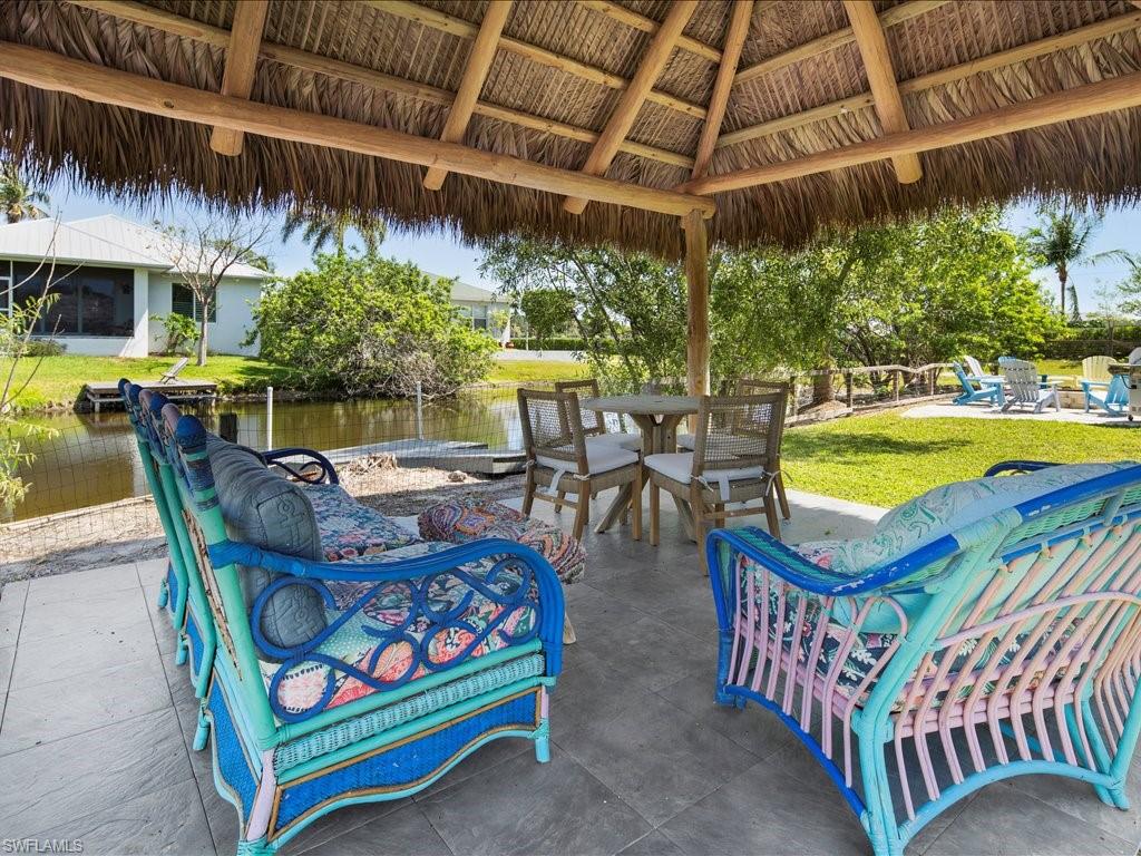 2469 Florida Avenue Naples, FL 34112 - Photo 5 of 31 View of patio with a water view