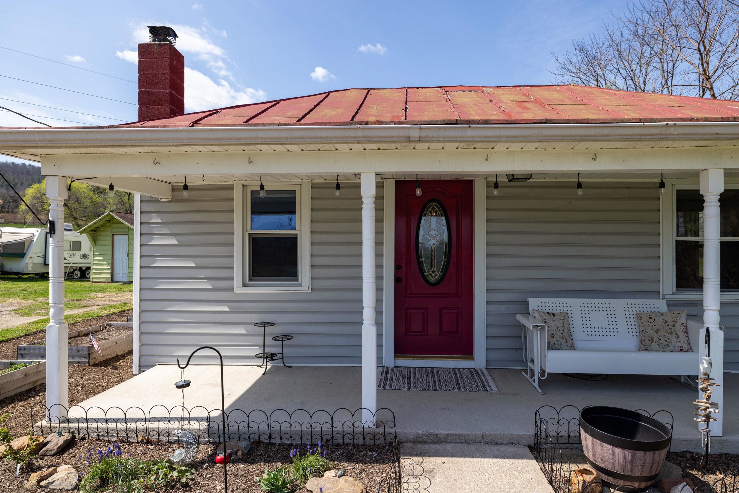 296 Keystone Road Stanley, VA 22851 - Photo 36 of 54 a front view of a house with chairs