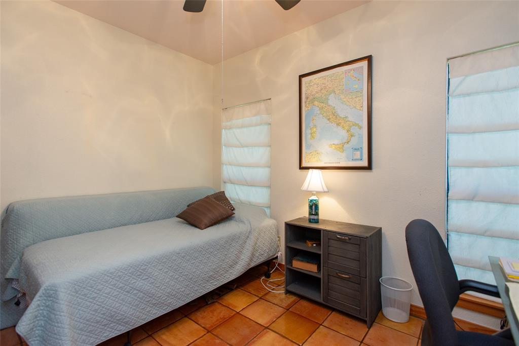 121 Xit Ranch Road Trinidad, TX 75163 - Photo 21 of 40 This room features terracotta tile flooring and window coverings