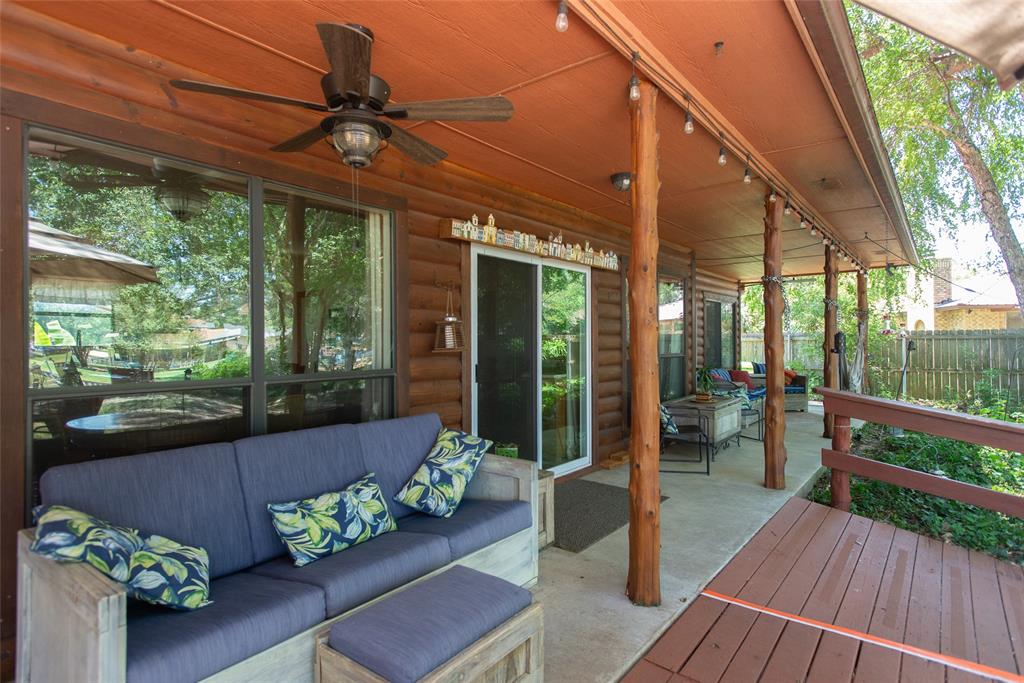 121 Xit Ranch Road Trinidad, TX 75163 - Photo 24 of 40 The property features an inviting covered patio with a ceiling fan, providing comfortable outdoor living