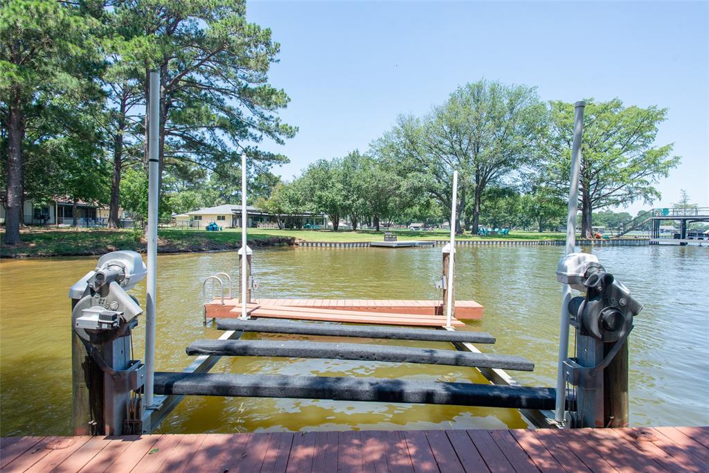 121 Xit Ranch Road Trinidad, TX 75163 - Photo 30 of 40 The property features a private boat dock with a lift system, offering direct access to the water