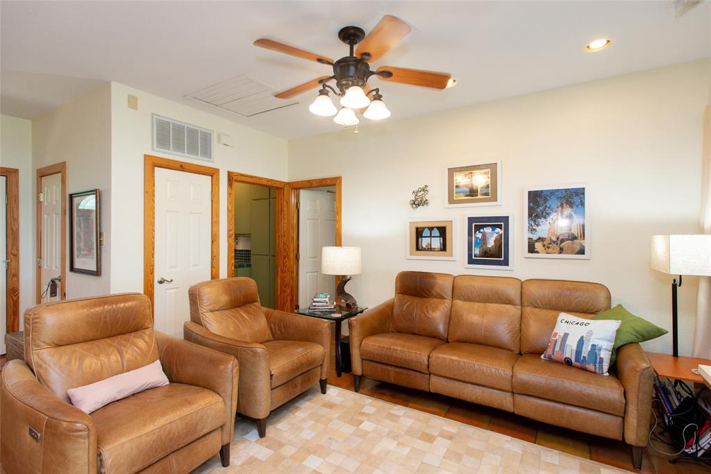 121 Xit Ranch Road Trinidad, TX 75163 - Photo 5 of 40 Living room featuring light-colored walls, a ceiling fan with integrated lighting, and recessed lighting