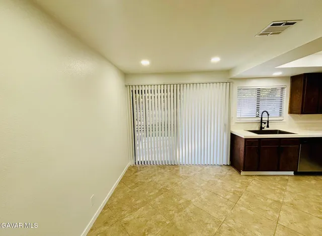 a view of kitchen with wooden floor