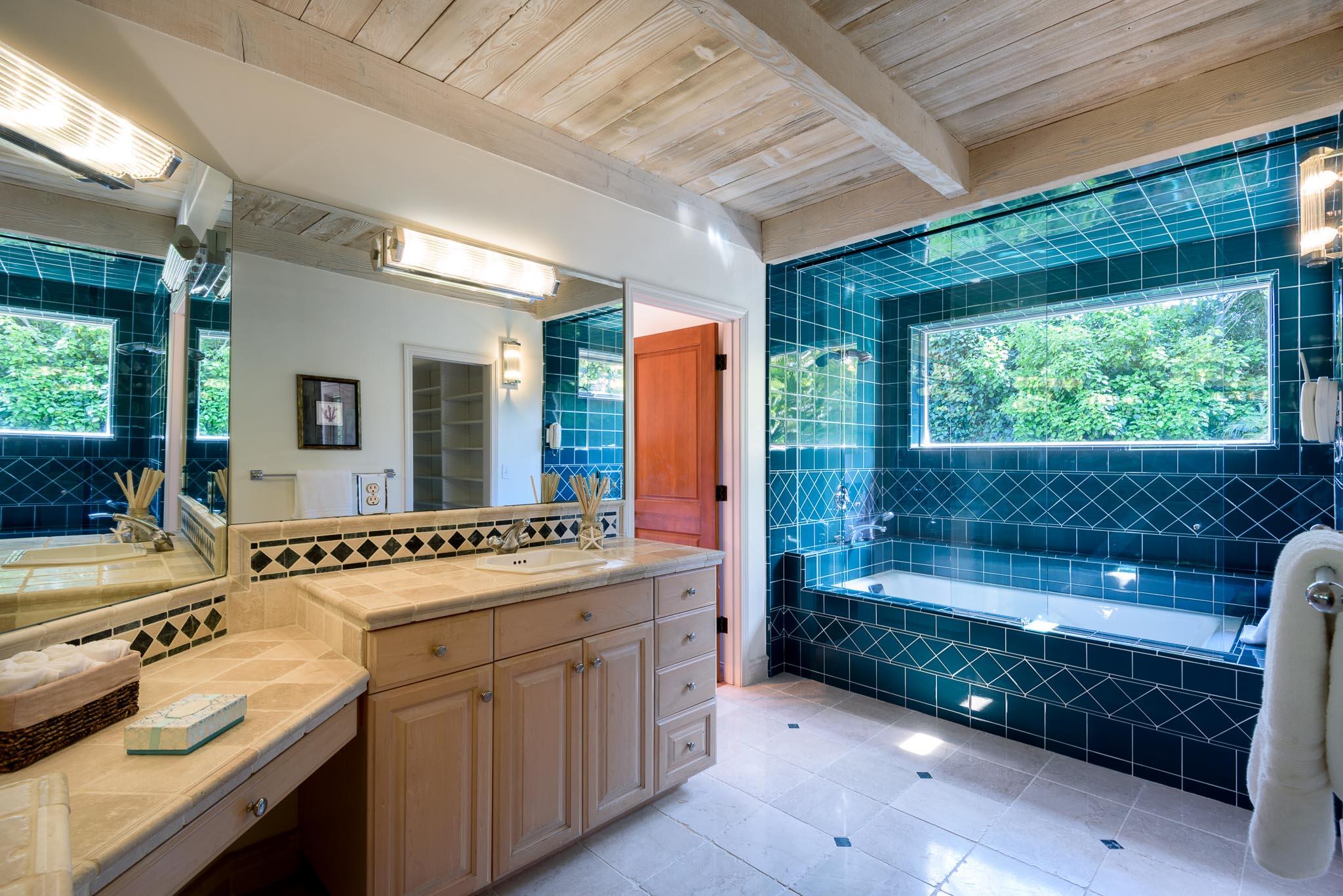 790 Ayala Lane Montecito, CA 93108 - Photo 12 of 24 a bathroom with a sink mirror double vanity and a bathtub