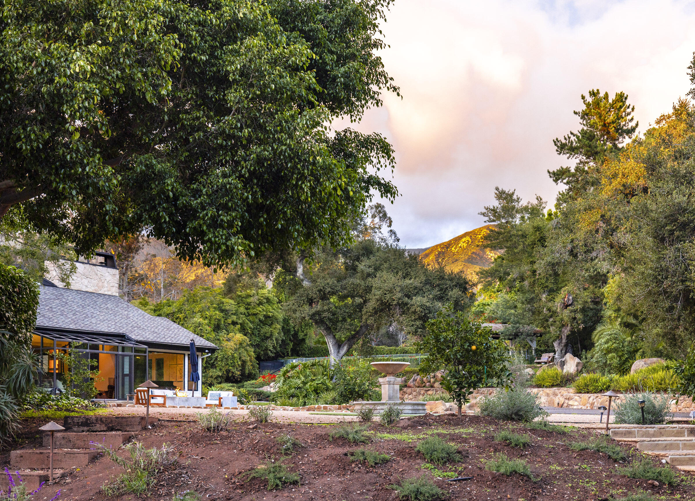 790 Ayala Lane Montecito, CA 93108 - Photo 22 of 24 a view of house with outdoor space and trees around