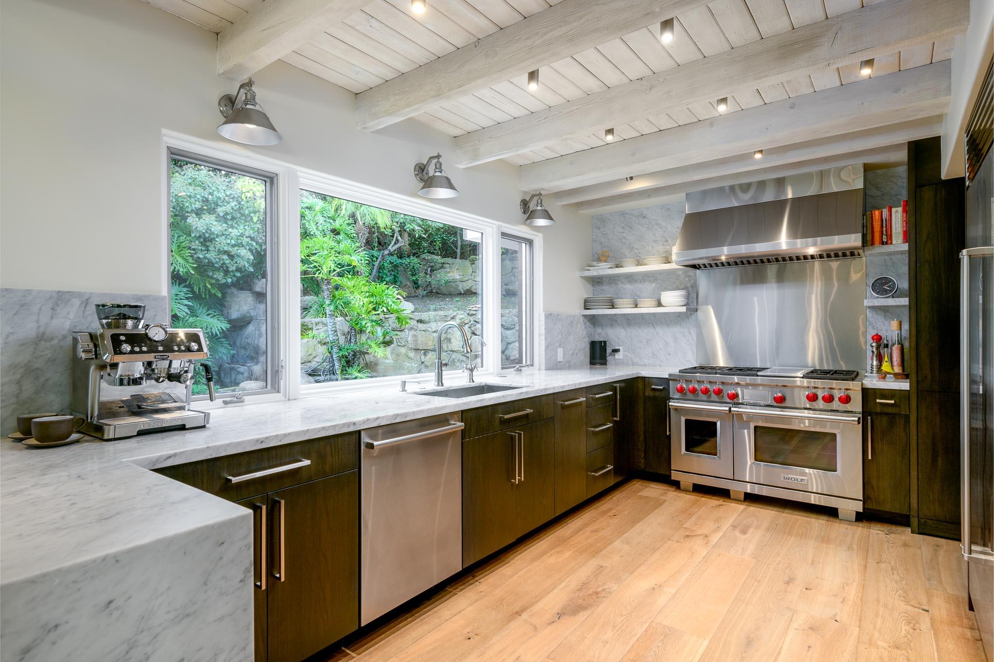 790 Ayala Lane Montecito, CA 93108 - Photo 8 of 24 a kitchen with stainless steel appliances granite countertop a sink stove and refrigerator