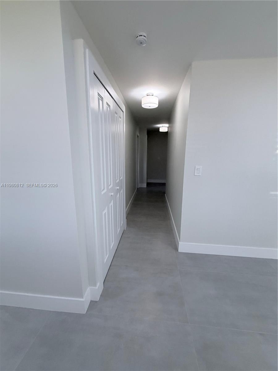 7801 Southwest 12th Street, Unit 7801 Miami, FL 33144 - Photo 5 of 12 a view of hallway