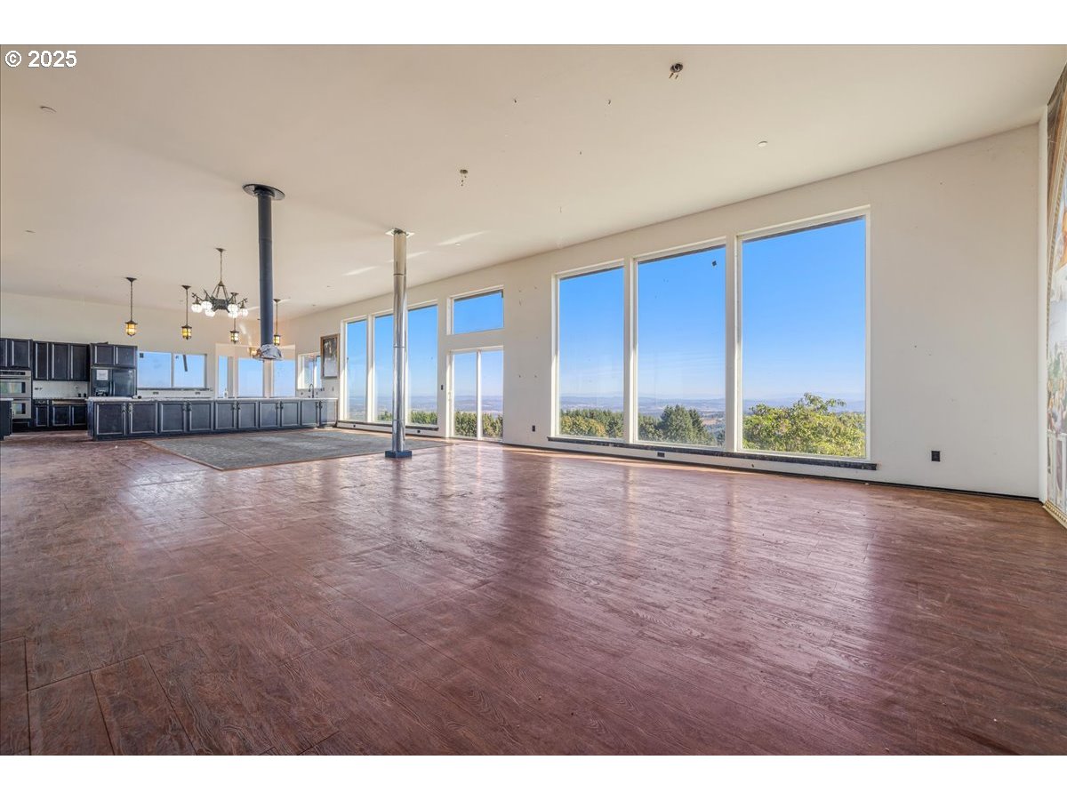18925 Northeast Jaquith Road Newberg, OR 97132 - Photo 13 of 27 a view of a living room and floor to ceiling room