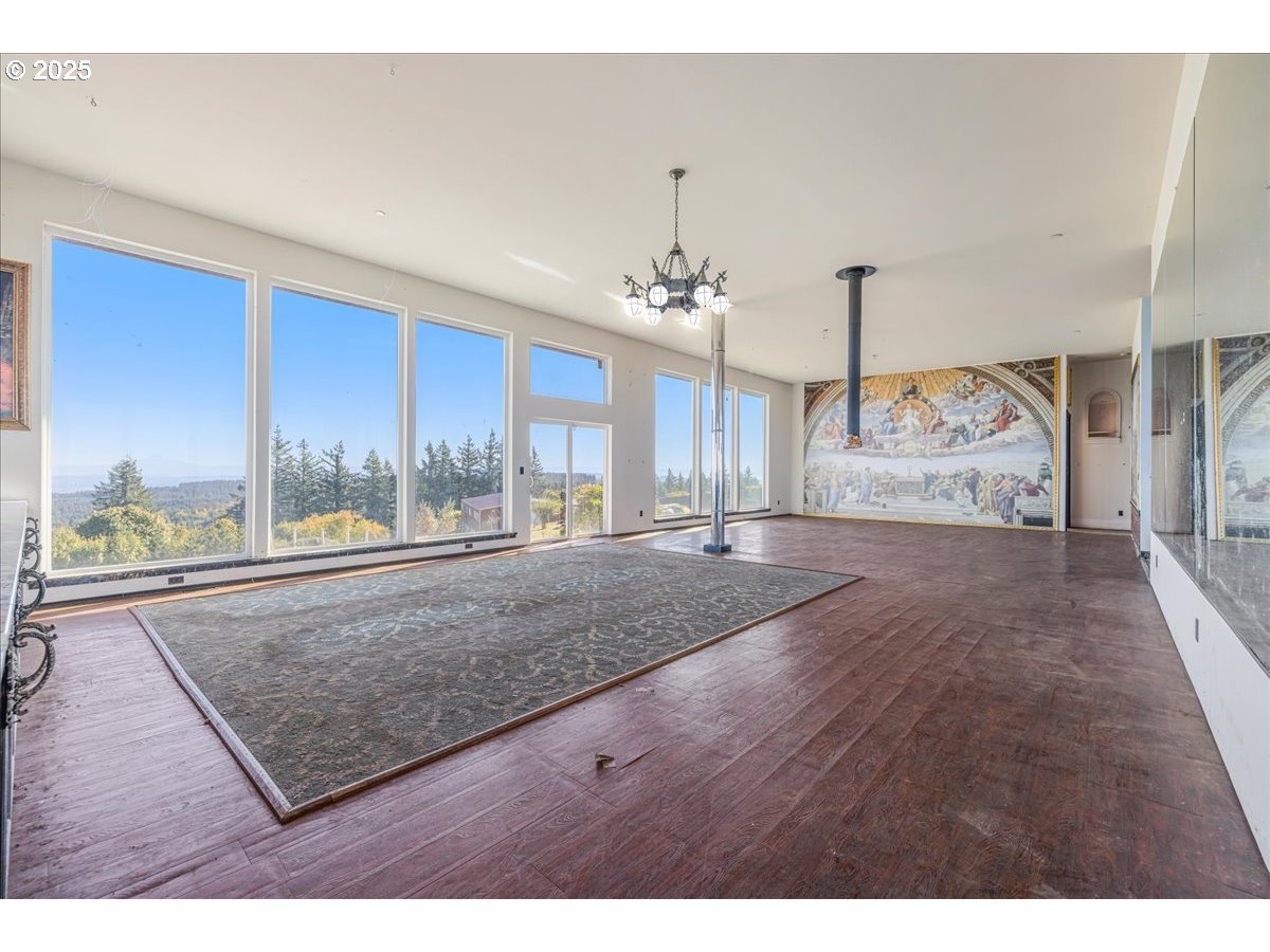 18925 Northeast Jaquith Road Newberg, OR 97132 - Photo 15 of 27 a view interior of a house wooden floor and chandelier