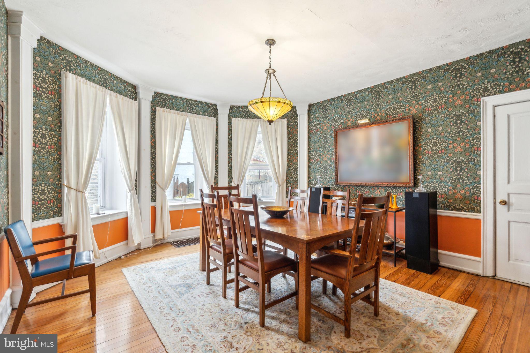 125 Township Line Road Jenkintown, PA 19046 - Photo 12 of 41 a view of a dining room with furniture window and wooden floor