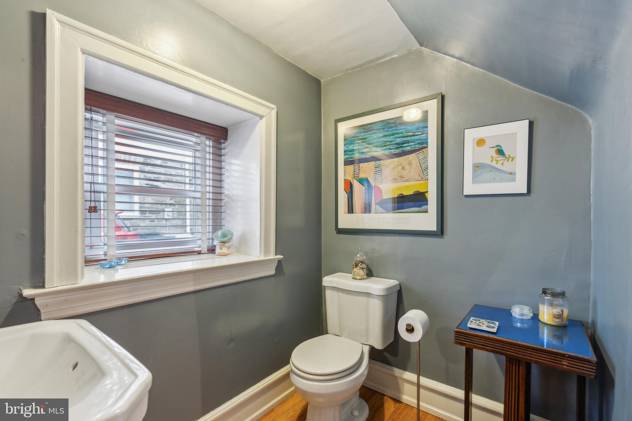 125 Township Line Road Jenkintown, PA 19046 - Photo 15 of 41 a white toilet sitting next to a bathroom sink