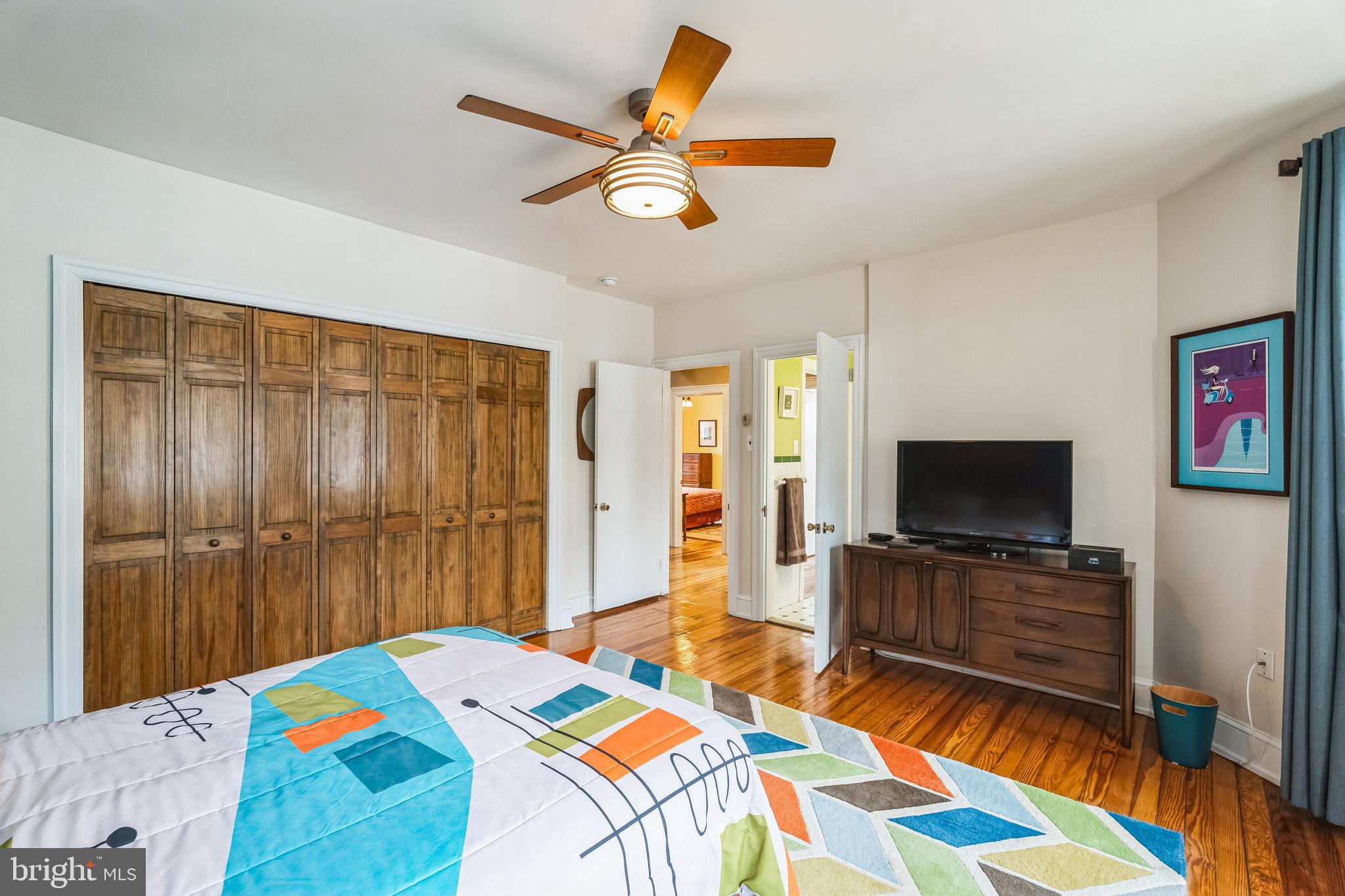 125 Township Line Road Jenkintown, PA 19046 - Photo 23 of 41 a bedroom with a bed and a flat screen tv