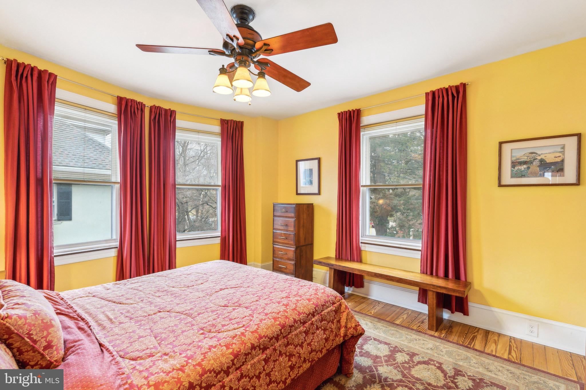 125 Township Line Road Jenkintown, PA 19046 - Photo 27 of 41 a bedroom with a balcony a bed and a window