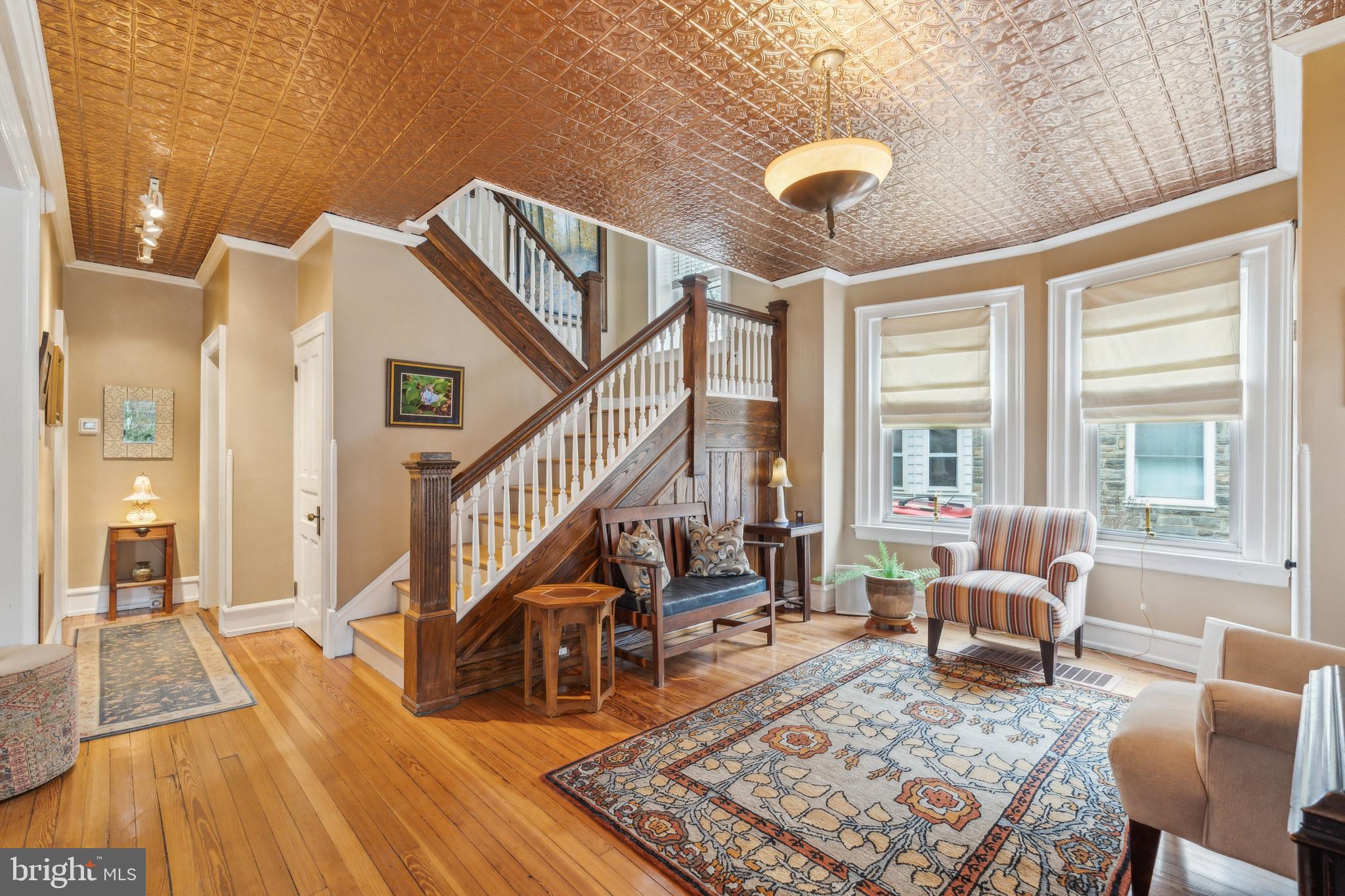 125 Township Line Road Jenkintown, PA 19046 - Photo 4 of 41 a living room with furniture and a wooden floor