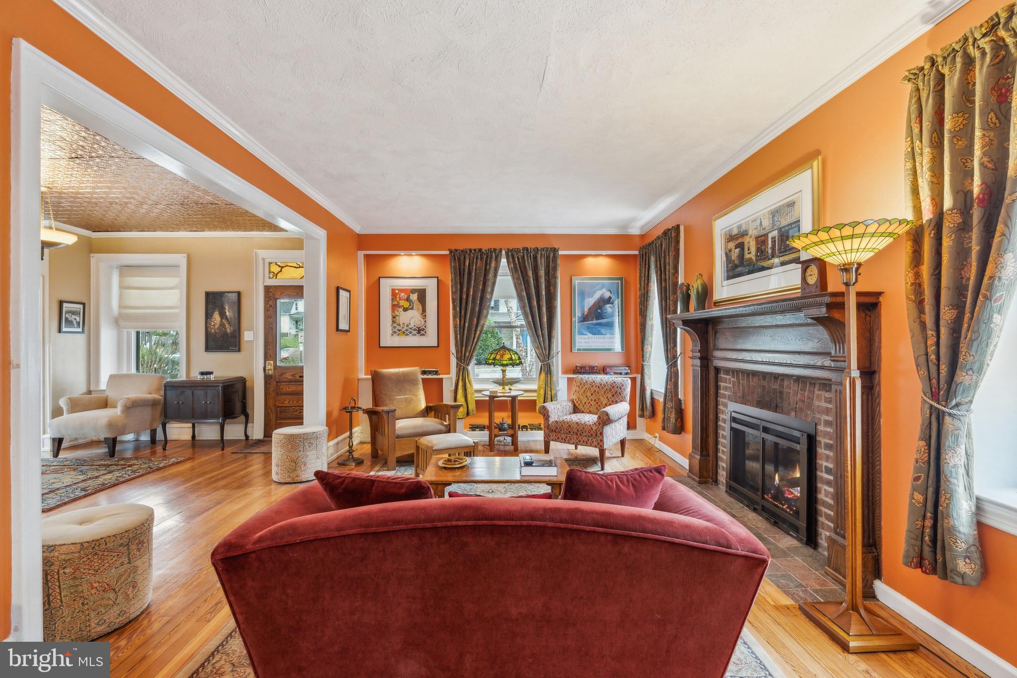 125 Township Line Road Jenkintown, PA 19046 - Photo 10 of 41 a living room with fireplace furniture and a large window