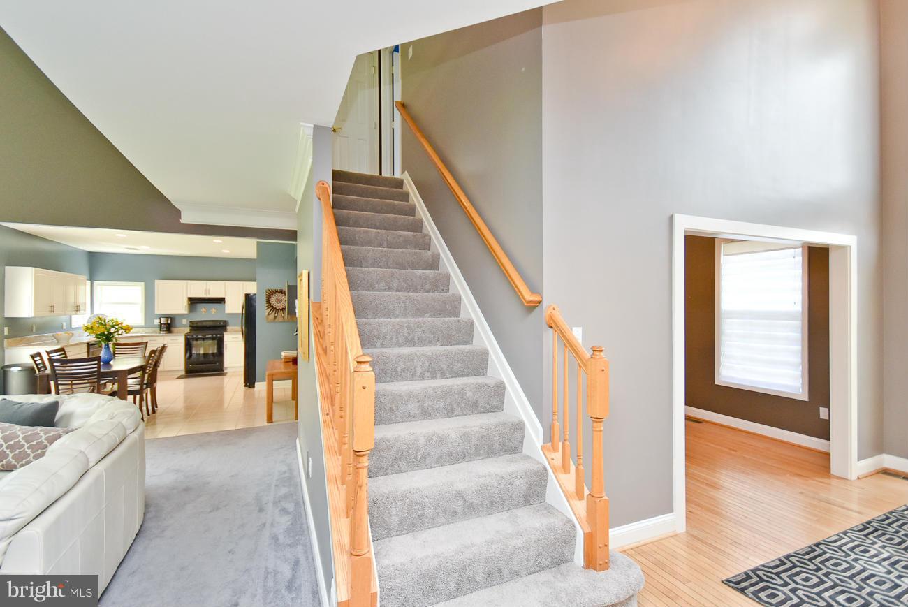 6417 Empty Song Road Columbia, MD 21044 - Photo 15 of 30 stairway to upper level