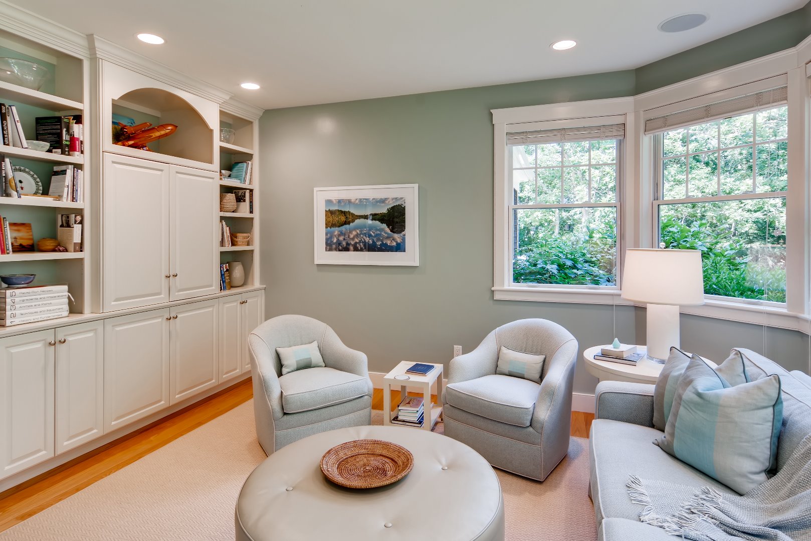 226 Pond Road West Tisbury, MA 02568 - Photo 14 of 42 has built in book cases and a row of windows.