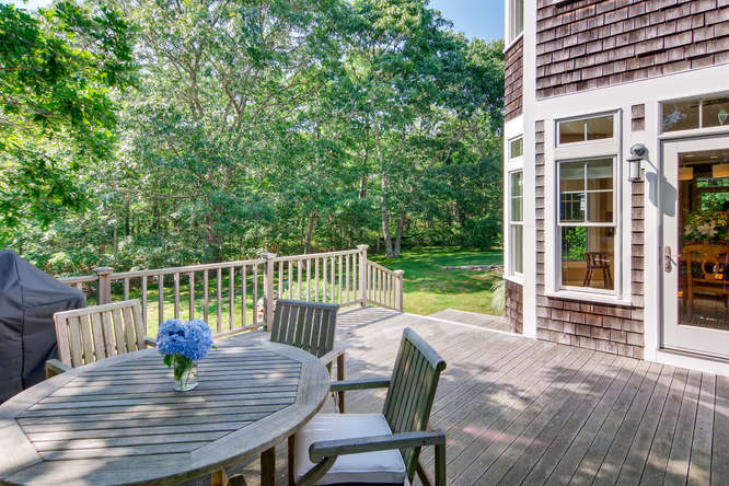 226 Pond Road West Tisbury, MA 02568 - Photo 34 of 42 a back deck off the dining area provides space to gather outside