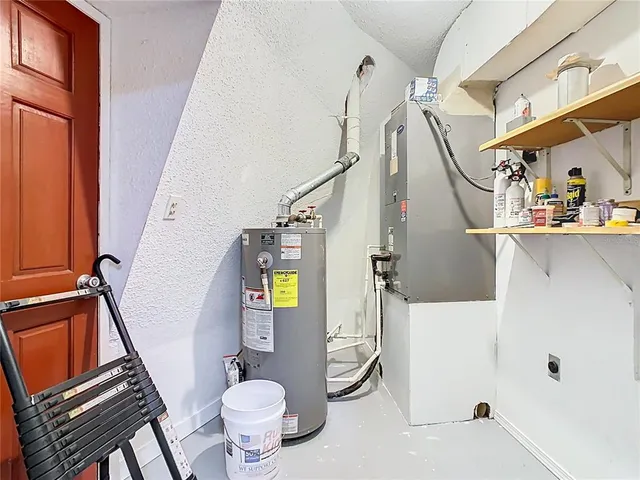 a view of staircase with a rug