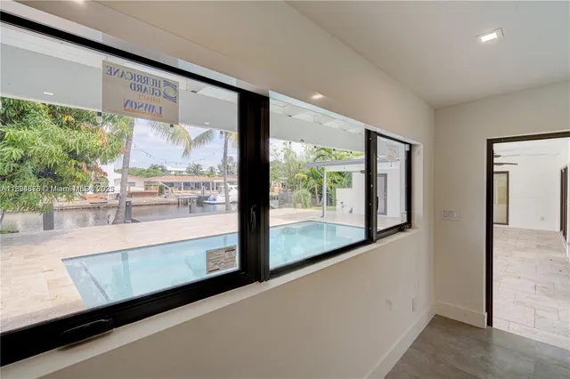 a kitchen with stainless steel appliances a refrigerator and a sink