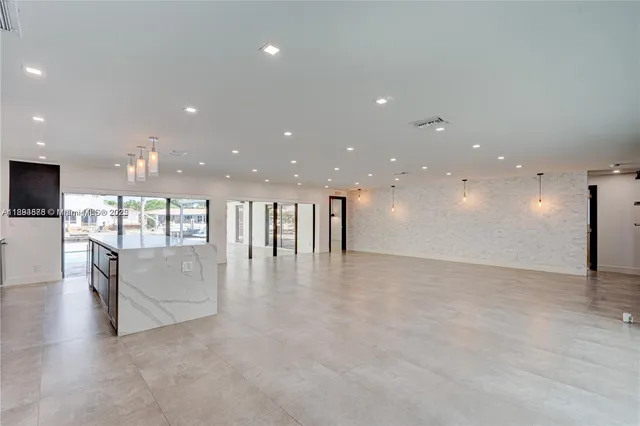 a bathroom with a sink a toilet and a bathtub