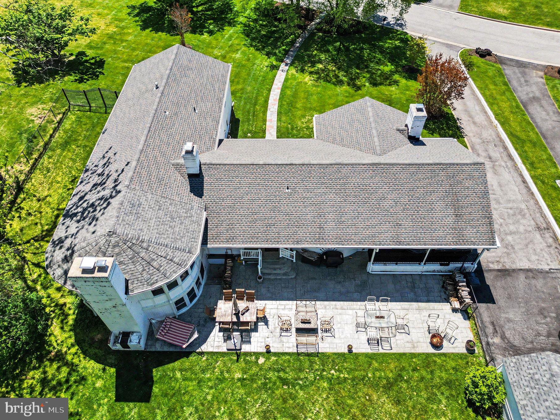 3522 Barton Oaks Road Baltimore, MD 21208 - Photo 2 of 86 an aerial view of a house with swimming pool and large trees