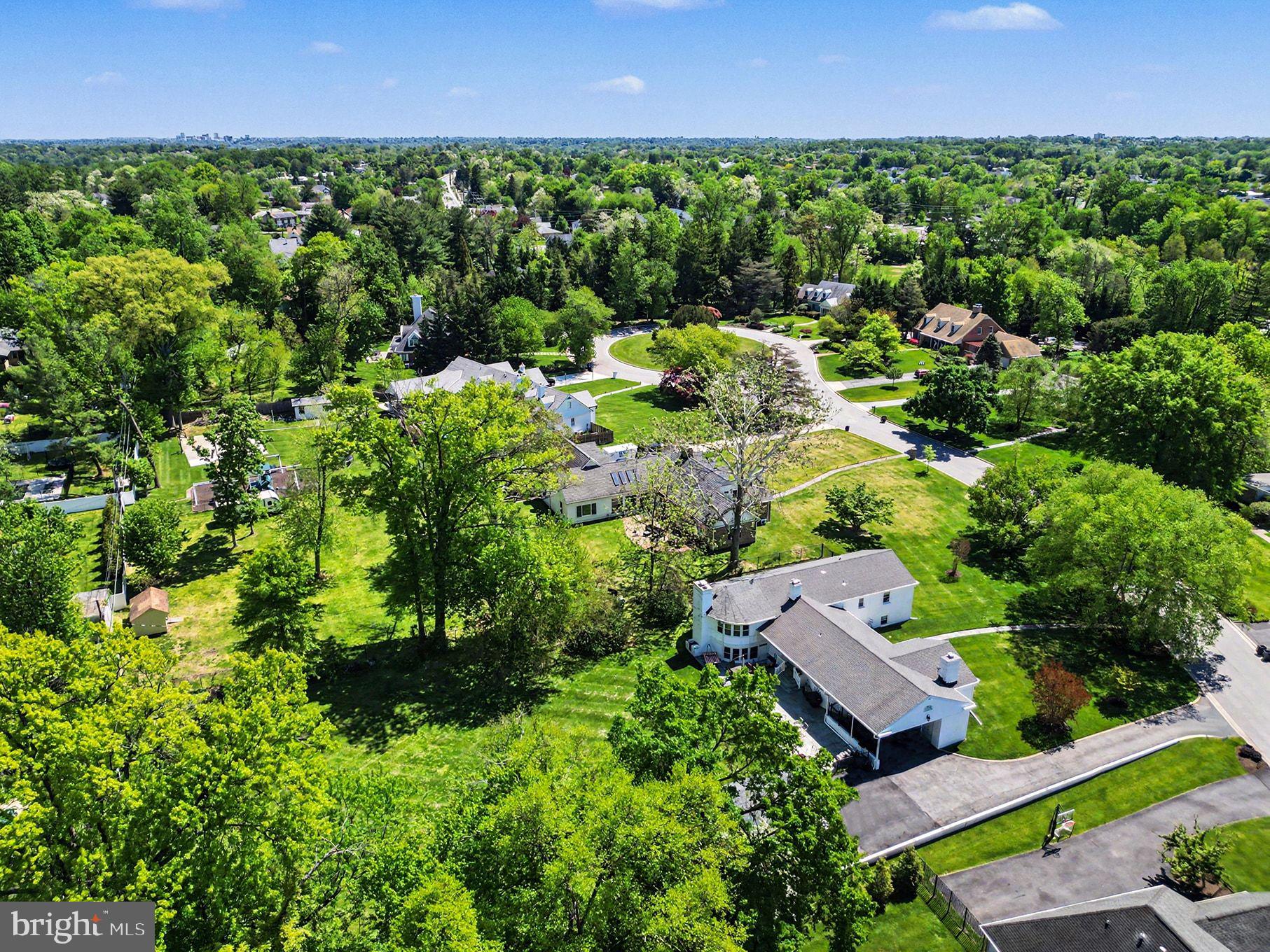 3522 Barton Oaks Road Baltimore, MD 21208 - Photo 7 of 86 an aerial view of a house with a yard