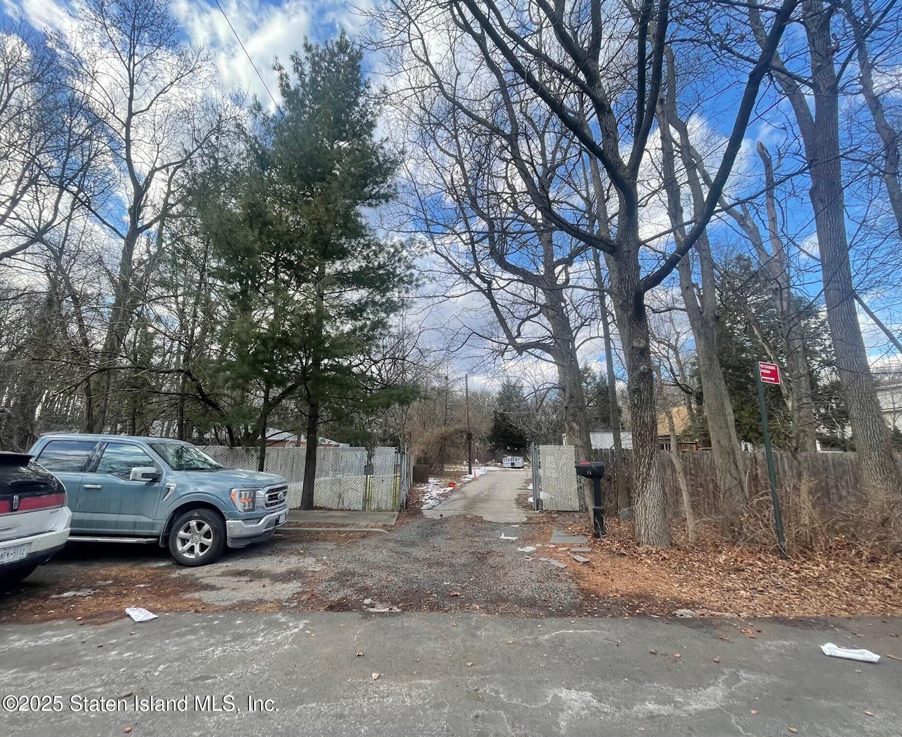 79 Halpin Avenue Staten Island, NY 10312 - Photo 3 of 7 a view of a car parked in front of a house