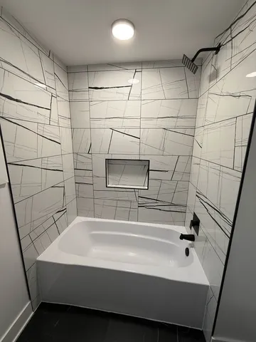 a bathroom with a sink and a shower