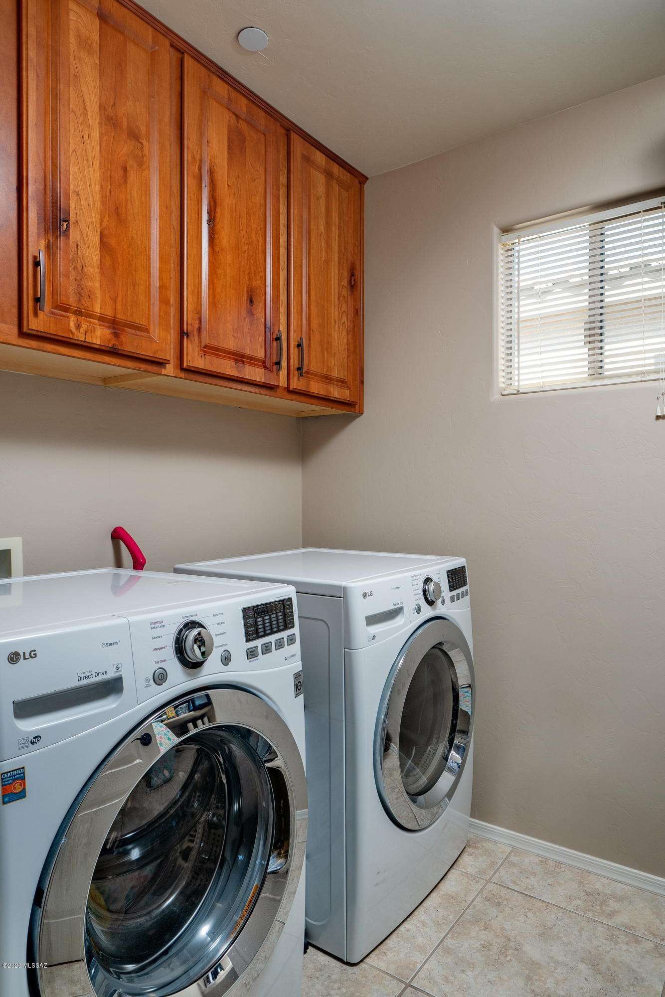 4440 West Crystal Ranch Place Marana, AZ 85658 - Photo 27 of 28 a utility room with dryer and washer