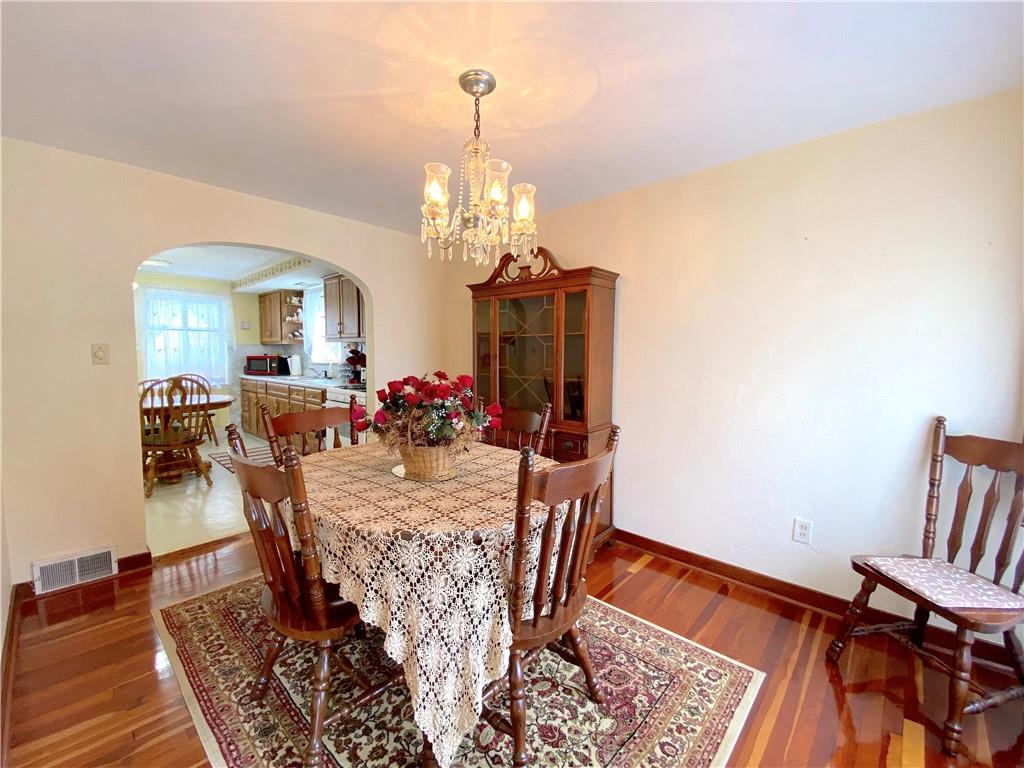560 Center Hill Road Pittsburgh, PA 15239 - Photo 12 of 25 a view of a dining room with furniture and window