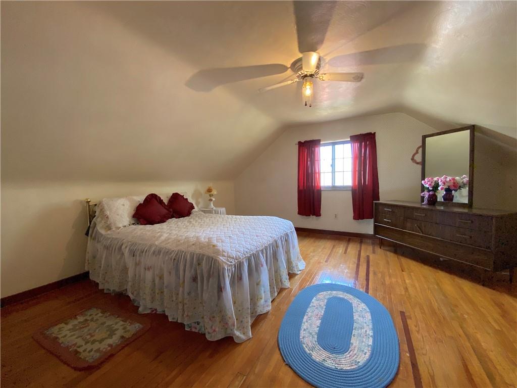 560 Center Hill Road Pittsburgh, PA 15239 - Photo 19 of 25 a bedroom with a bed and window