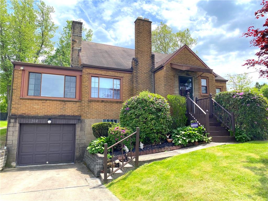 560 Center Hill Road Pittsburgh, PA 15239 - Photo 3 of 25 a front view of a house with a yard
