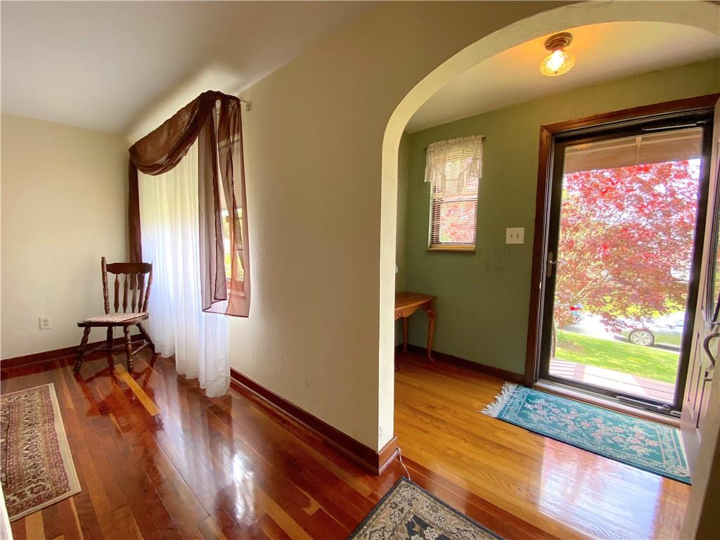 560 Center Hill Road Pittsburgh, PA 15239 - Photo 4 of 25 a view of front door with wooden floor