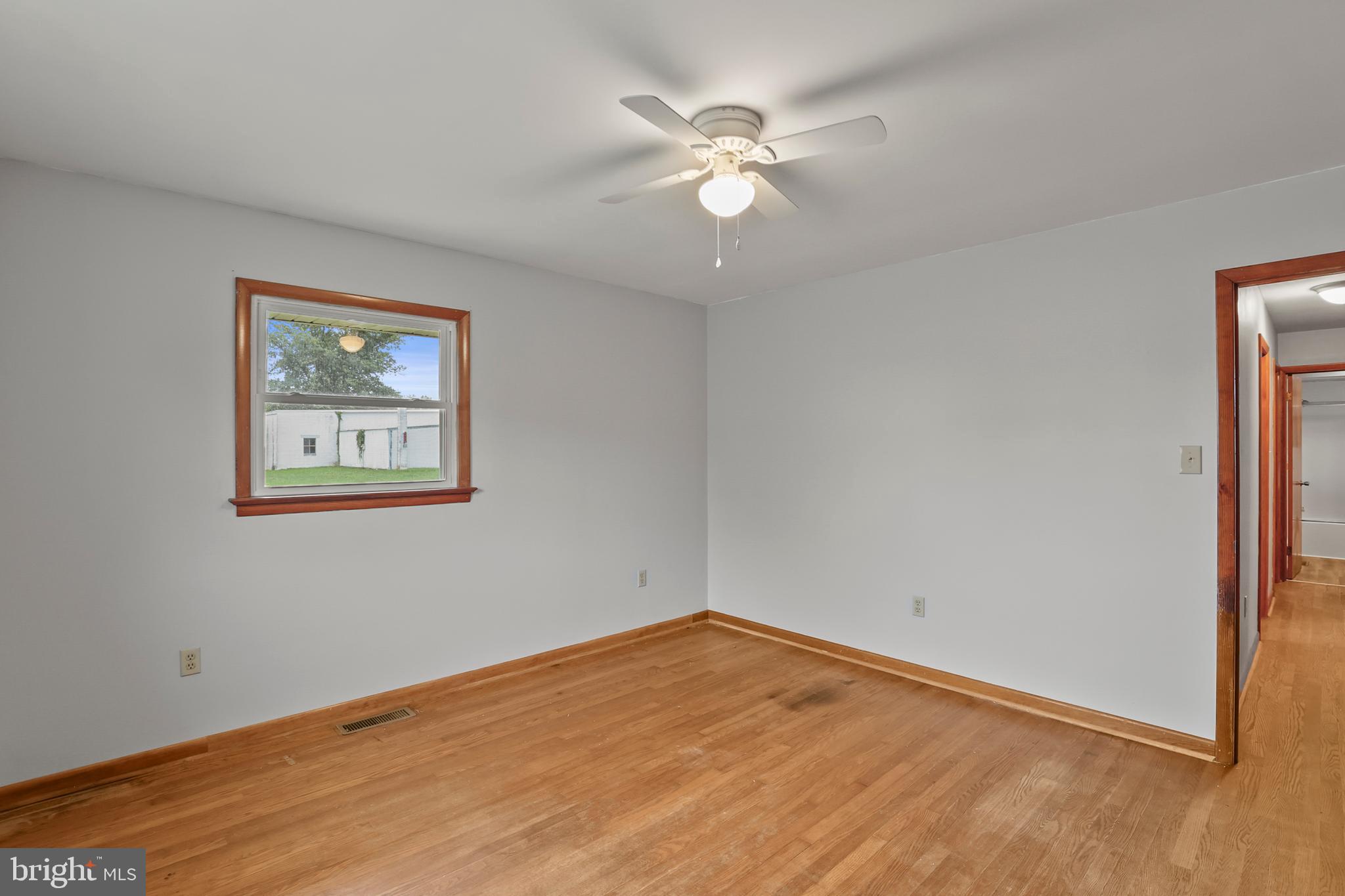 2152 White Hall Road Littlestown, PA 17340 - Photo 13 of 46 a view of an empty room with wooden floor