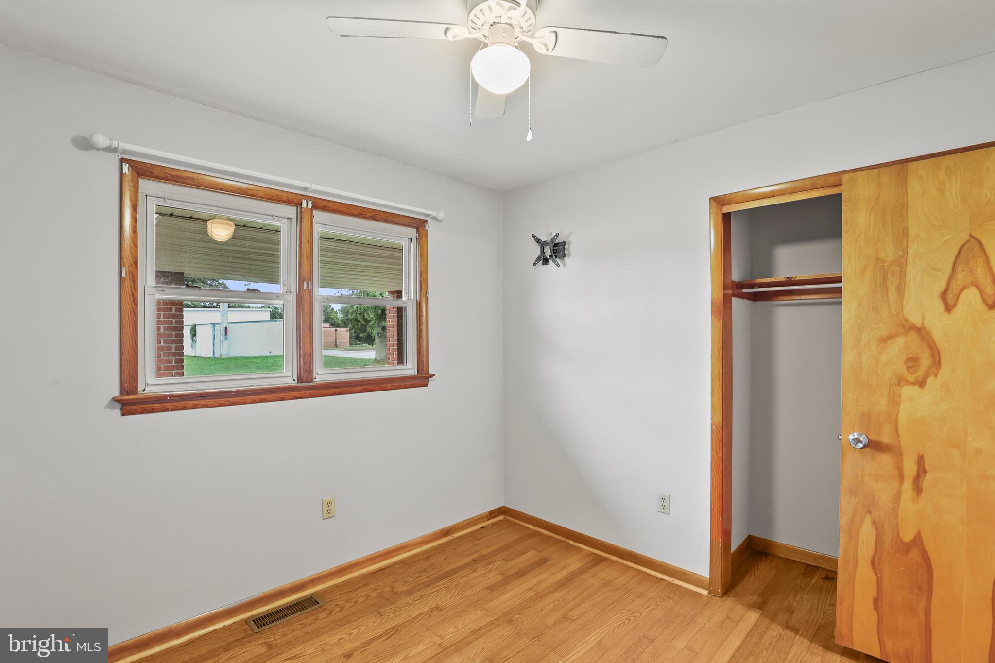 2152 White Hall Road Littlestown, PA 17340 - Photo 16 of 46 a view of an empty room with window and wooden floor