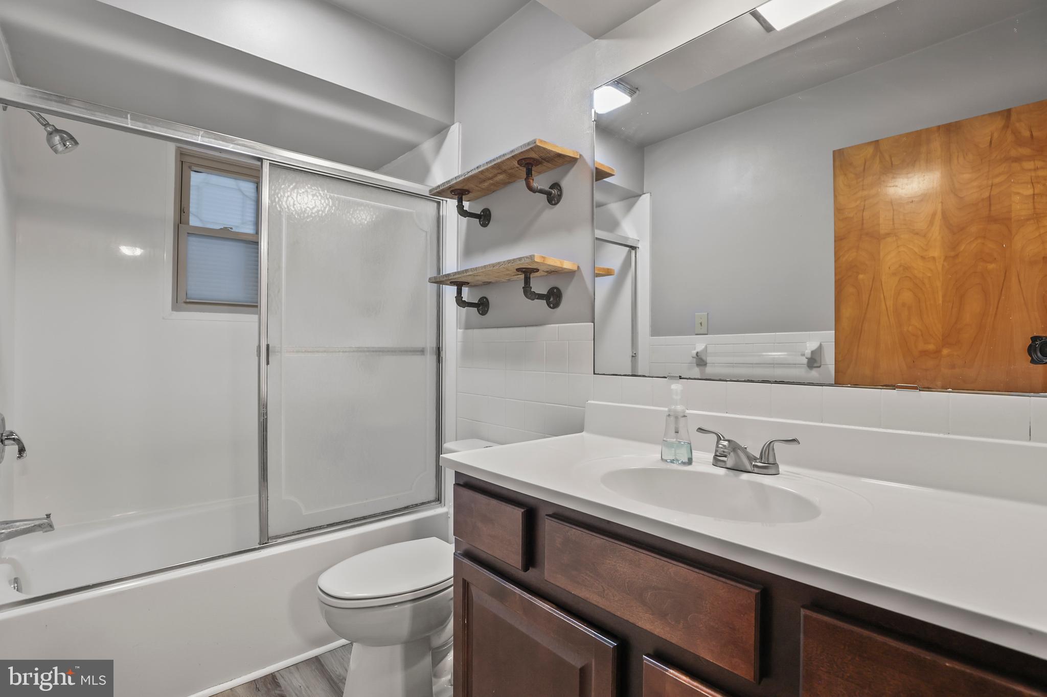 2152 White Hall Road Littlestown, PA 17340 - Photo 19 of 46 a bathroom with a sink toilet and shower